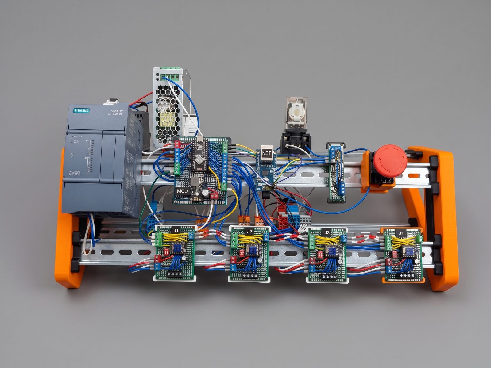 The control panel: Siemens S7-1200, power supply, MCU and four stepper driver boards on DIN rail